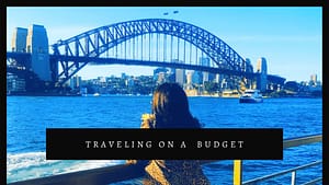 stylish woman at the waterfront viewing sydney harbor bridge in australia